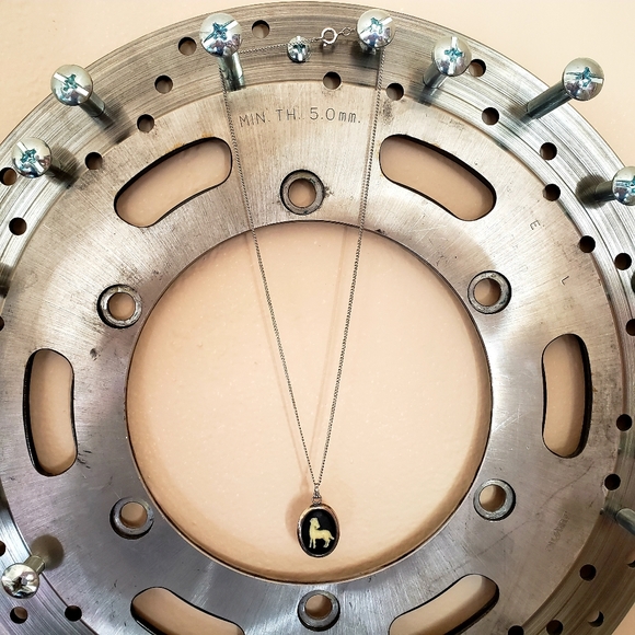 Silver necklace with black & cream Aries pendant - Picture 1 of 3